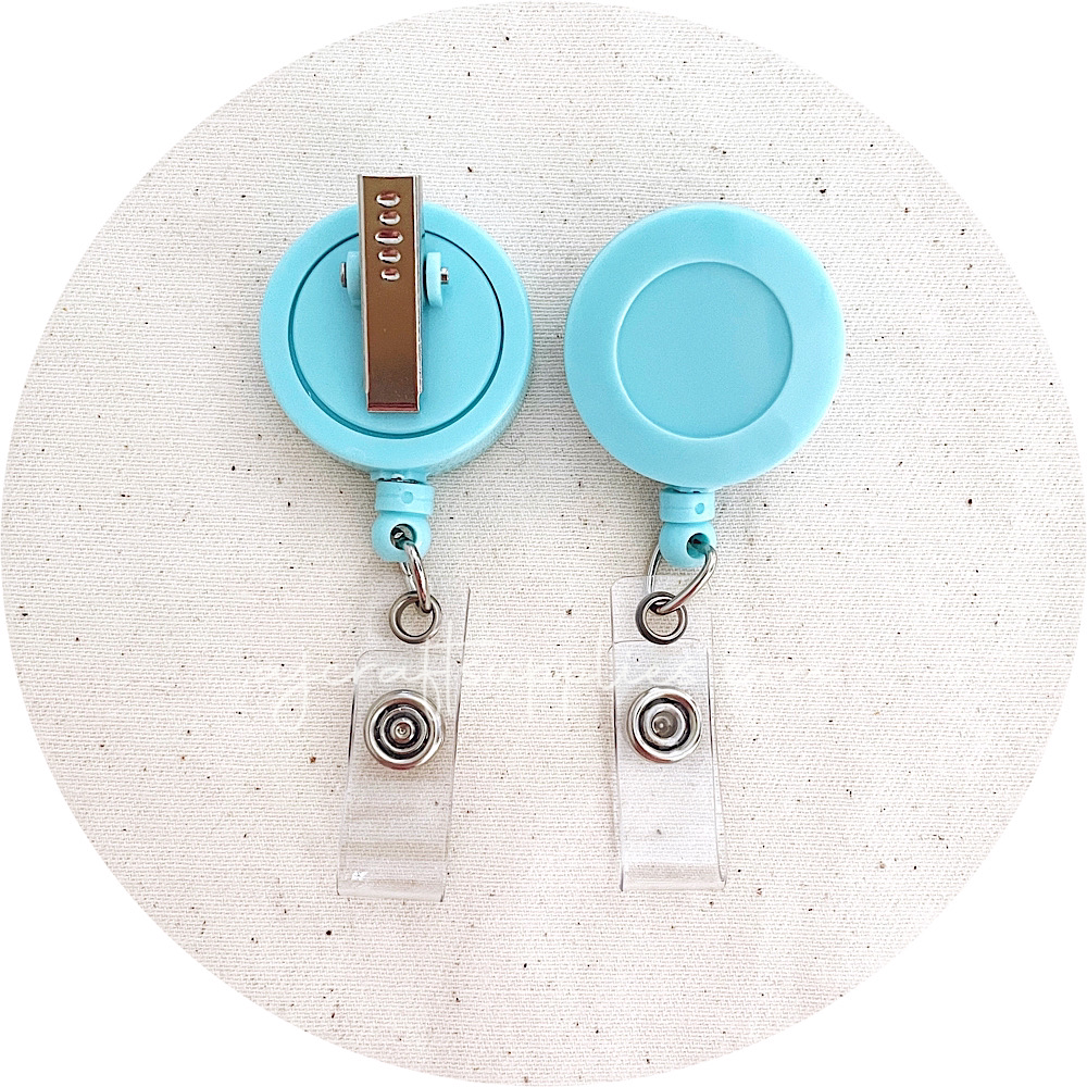Retractable Badge Reel with Rotating Alligator Clip - Light Blue - Each
